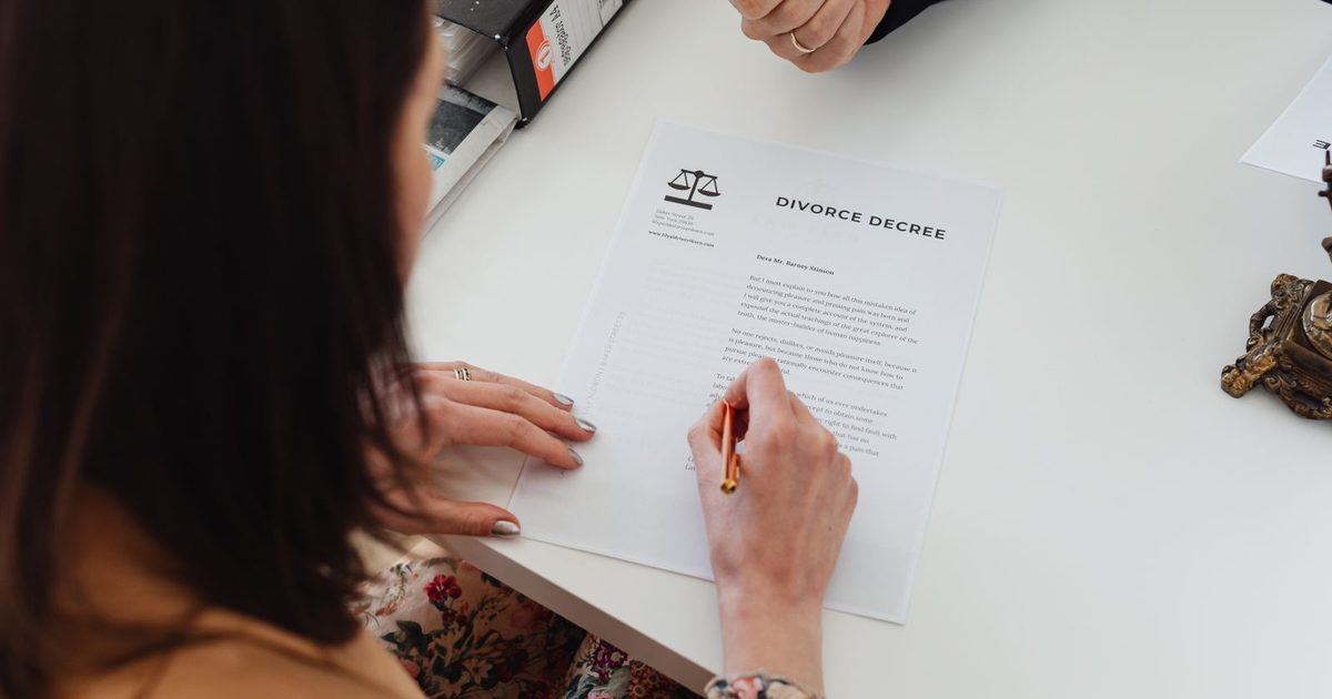 Divorce document being reviewed with a pen before certified translation in Australia